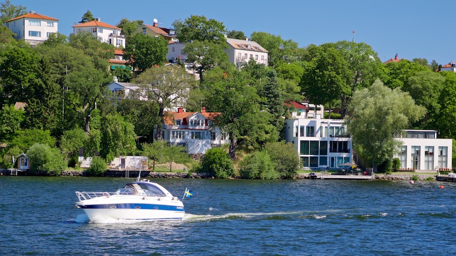 Drottningholm showing boating, a lake or waterhole and a small town or village