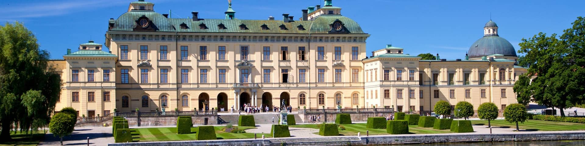 Drottningholm Palace showing a river or creek and heritage architecture