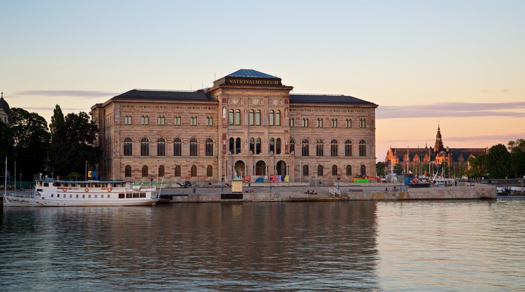 National Museum featuring a sunset, heritage architecture and a river or creek