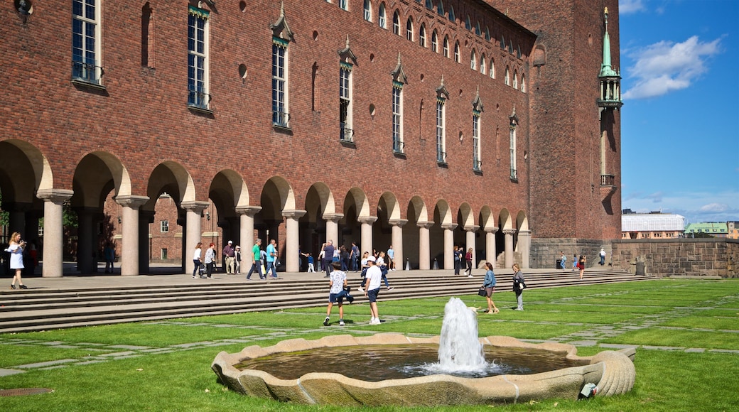 Stockholm City Conference Centre featuring a garden, a fountain and heritage architecture