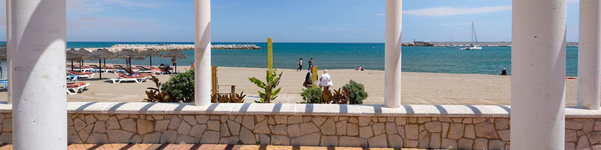 Los Boliches Beach which includes a sandy beach and general coastal views