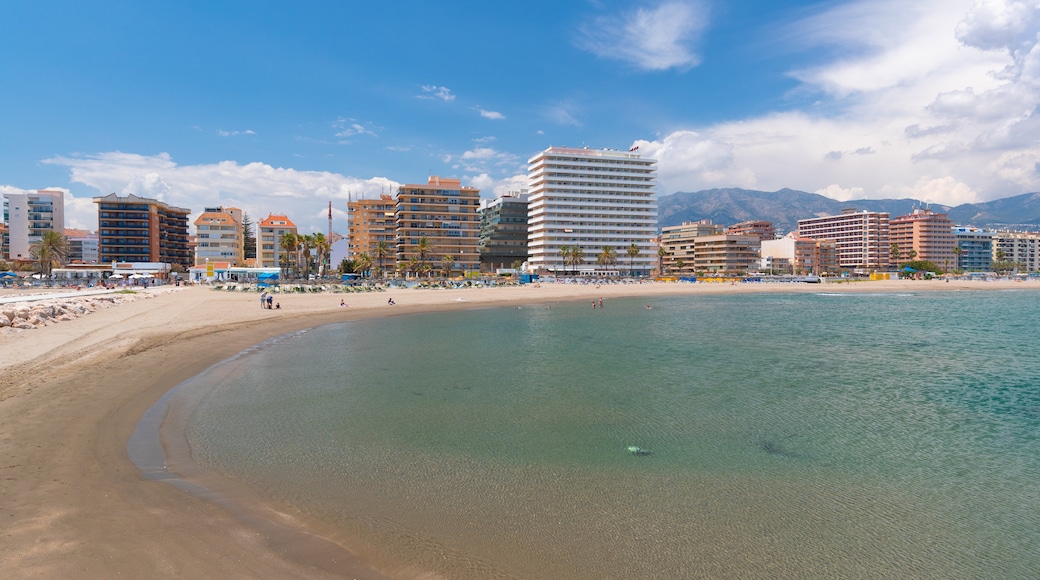 Los Boliches Beach featuring a coastal town, a beach and general coastal views