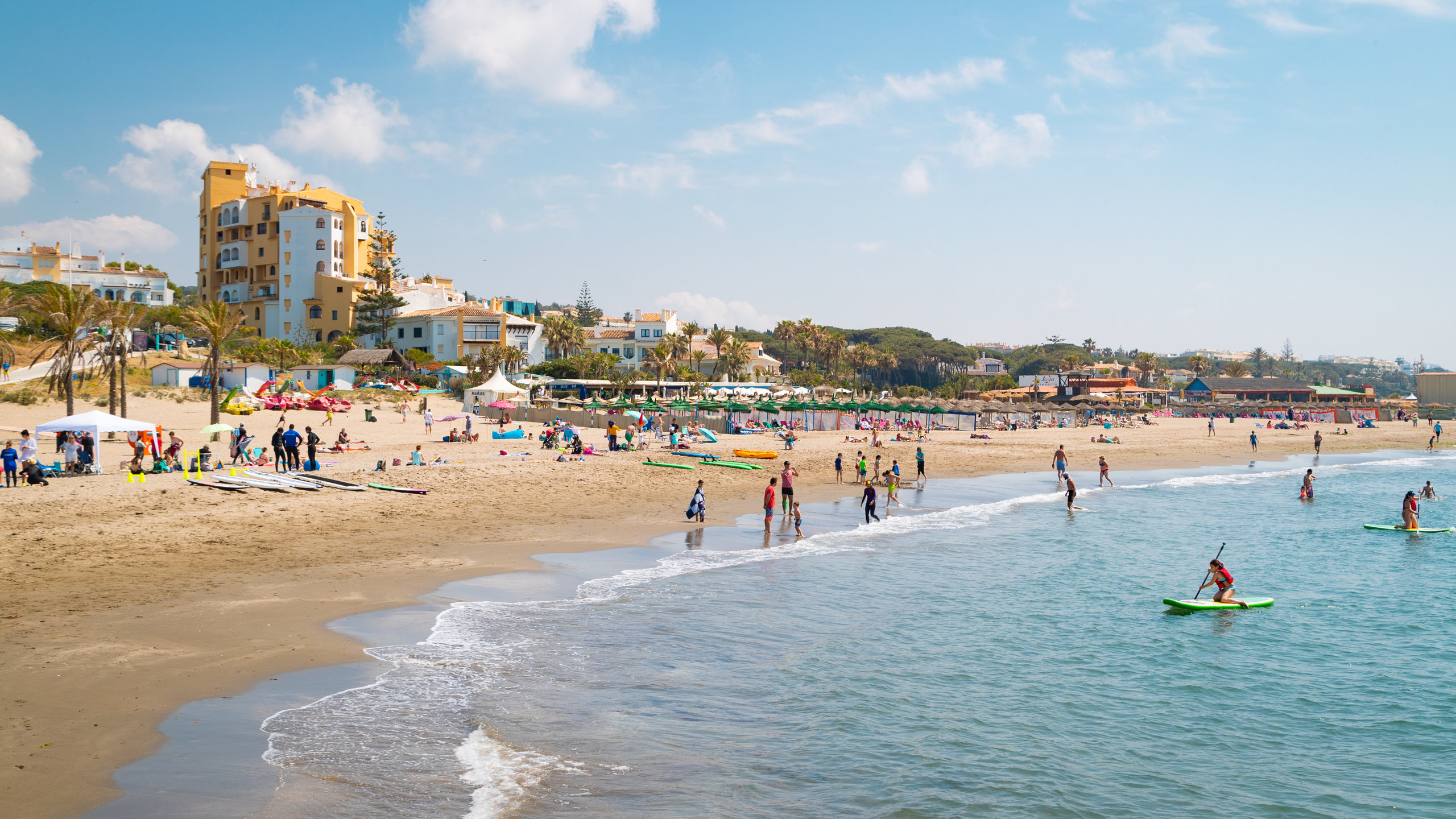 Cabopino Beach showing general coastal views, kayaking or canoeing and a sandy beach