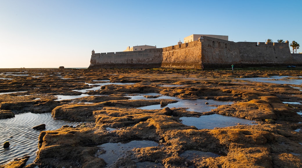 St Maarten and St Martin showing heritage architecture, a castle and a sunset