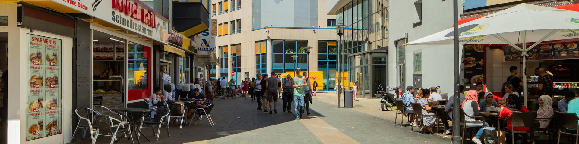 Dortmund City Centre which includes street scenes and a city as well as a small group of people