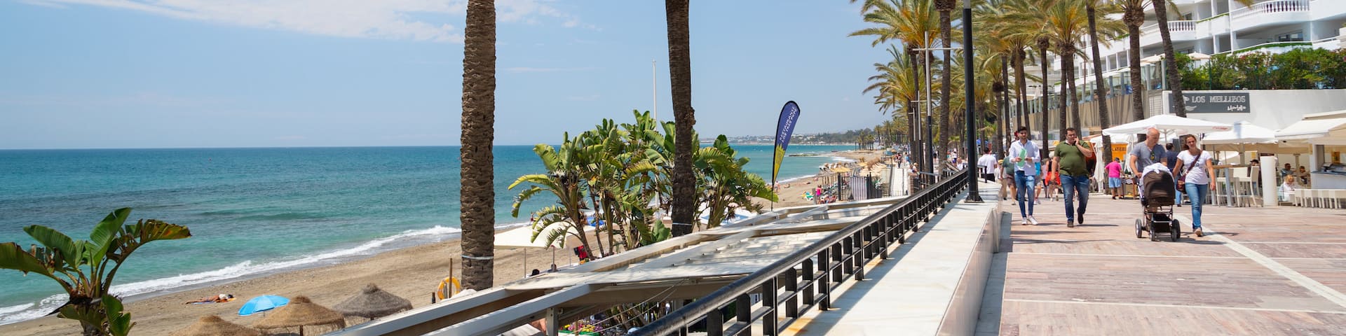 Marbella Seafront Promenade which includes general coastal views and a coastal town