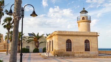 Roquetas de Mar which includes a lighthouse and a coastal town