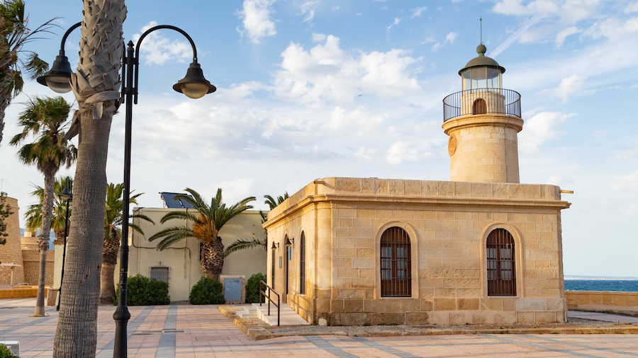 Roquetas de Mar which includes a lighthouse and a coastal town