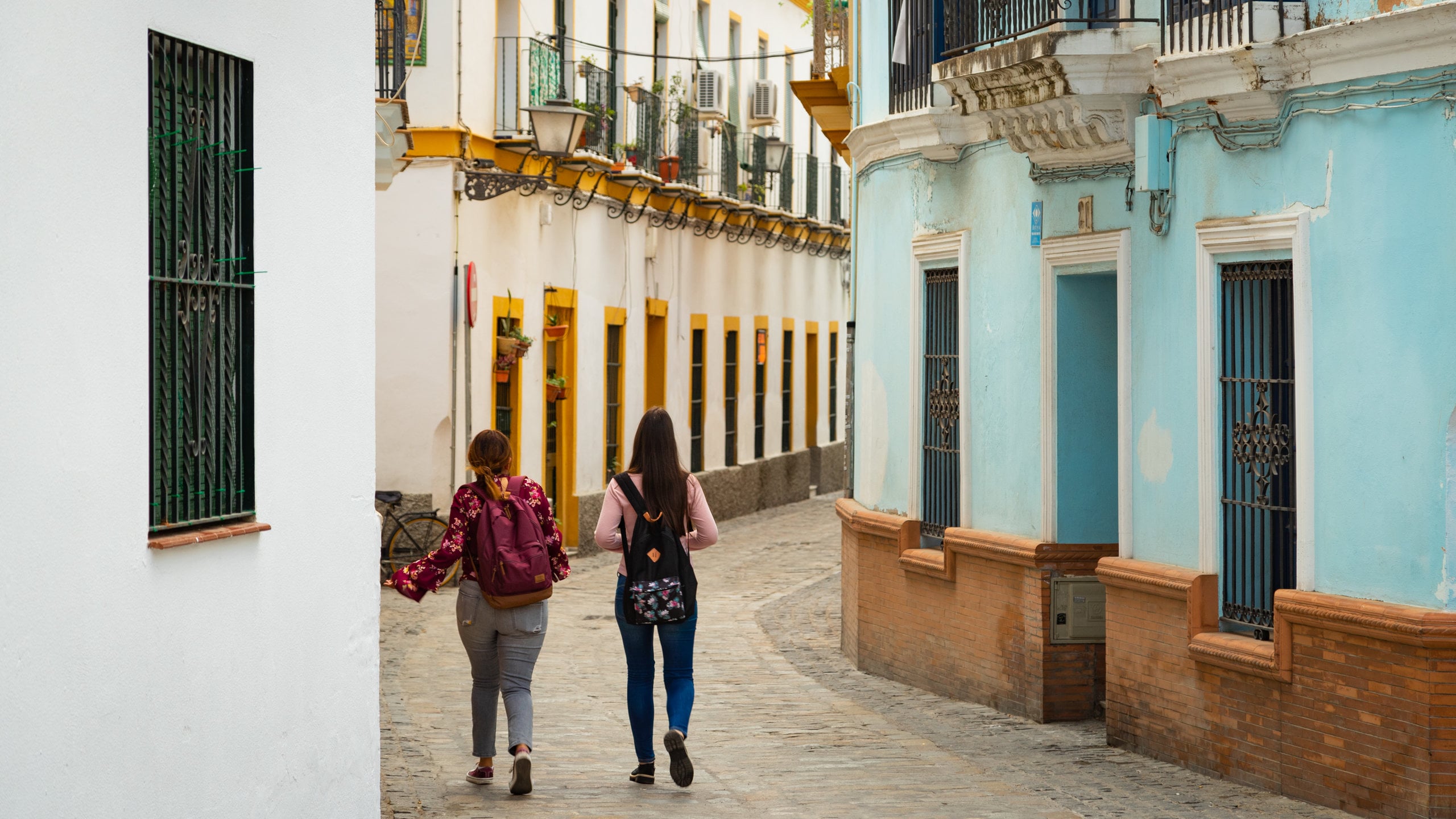 Macarena featuring street scenes as well as a couple