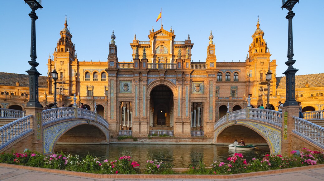 Plaza de Espana featuring a sunset, heritage architecture and a bridge