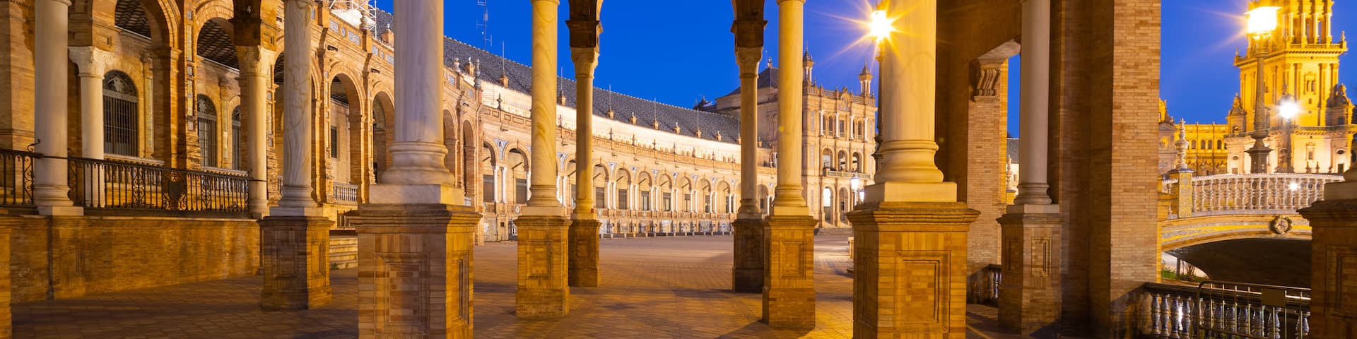 Plaza de Espana which includes heritage elements and night scenes