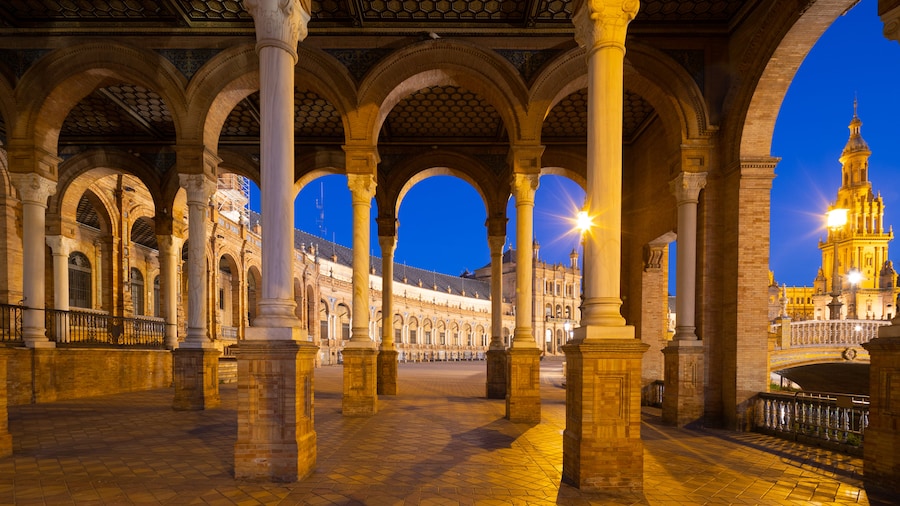 Plaza de Espana which includes heritage elements and night scenes