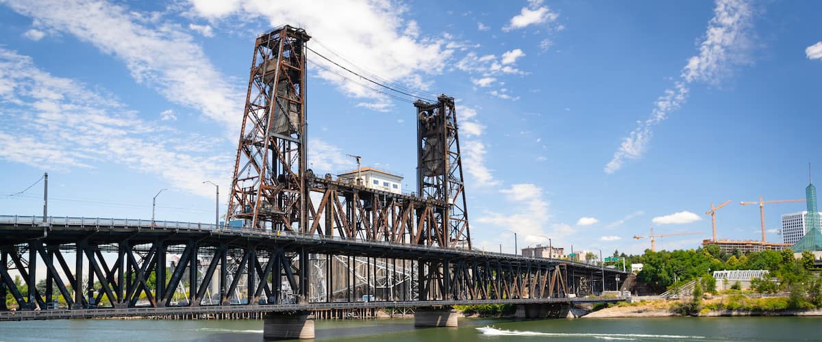 Steel Bridge which includes a river or creek and a bridge
