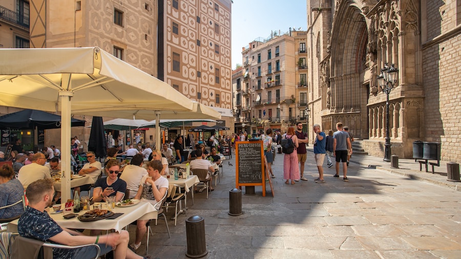 Outdoor dining and historic architecture in El Born neighborhood of Barcelona.