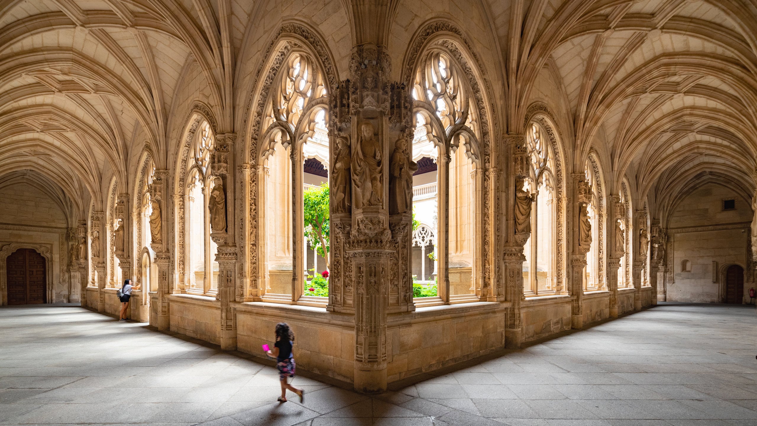 San Juan de los Reyes Monastery featuring interior views and heritage elements as well as an individual child