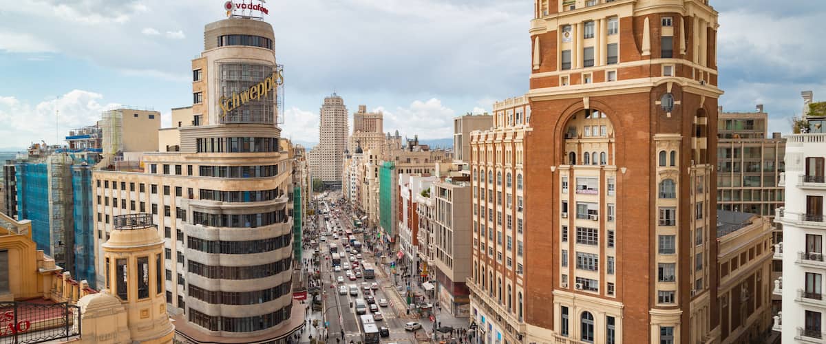 Madrid which includes a city, signage and landscape views
