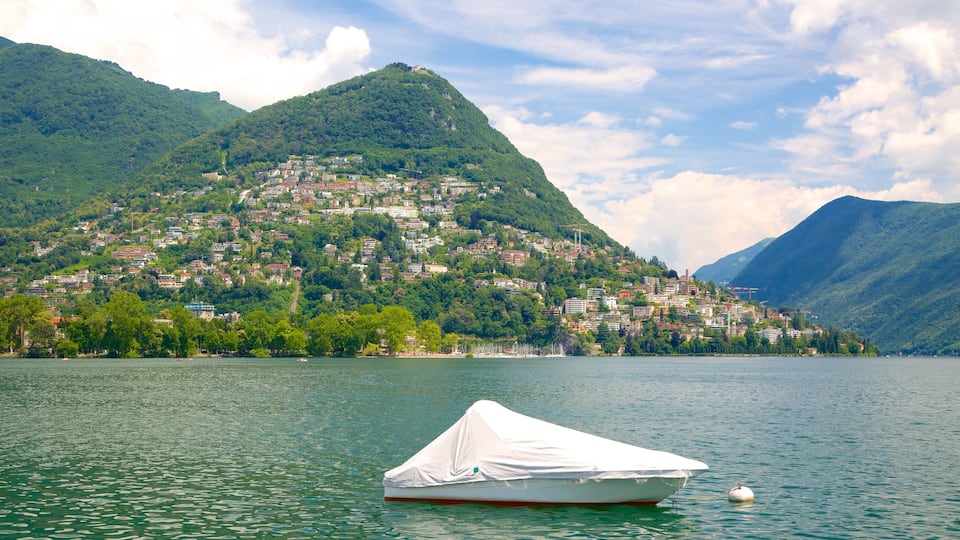 Lugano showing landscape views, a small town or village and a river or creek