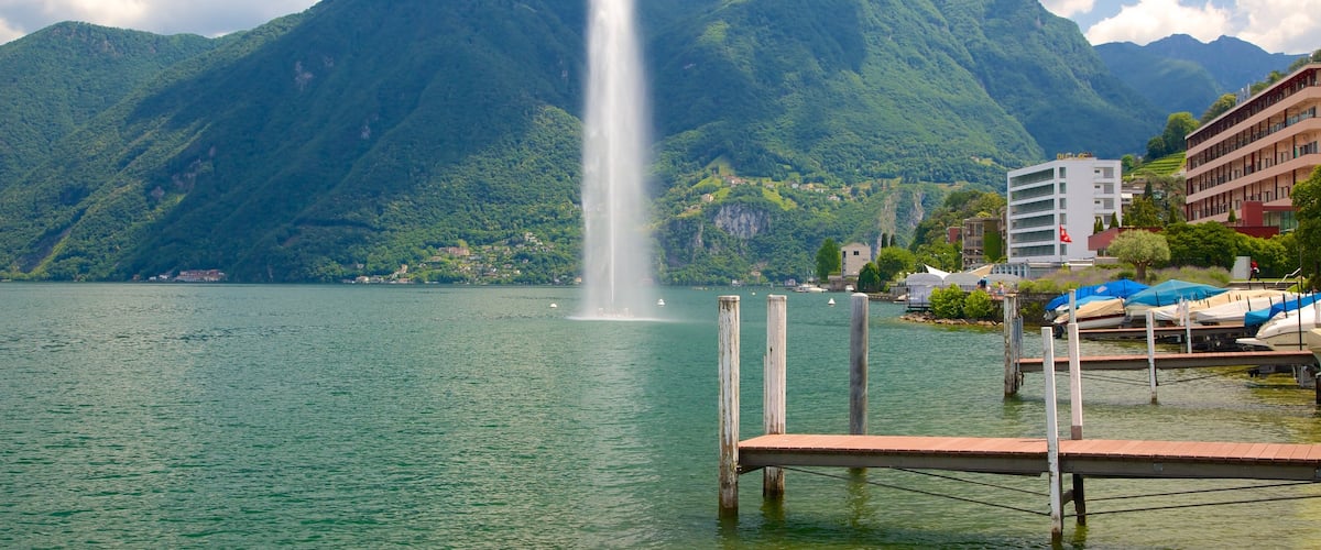 Paradiso which includes a fountain and a lake or waterhole