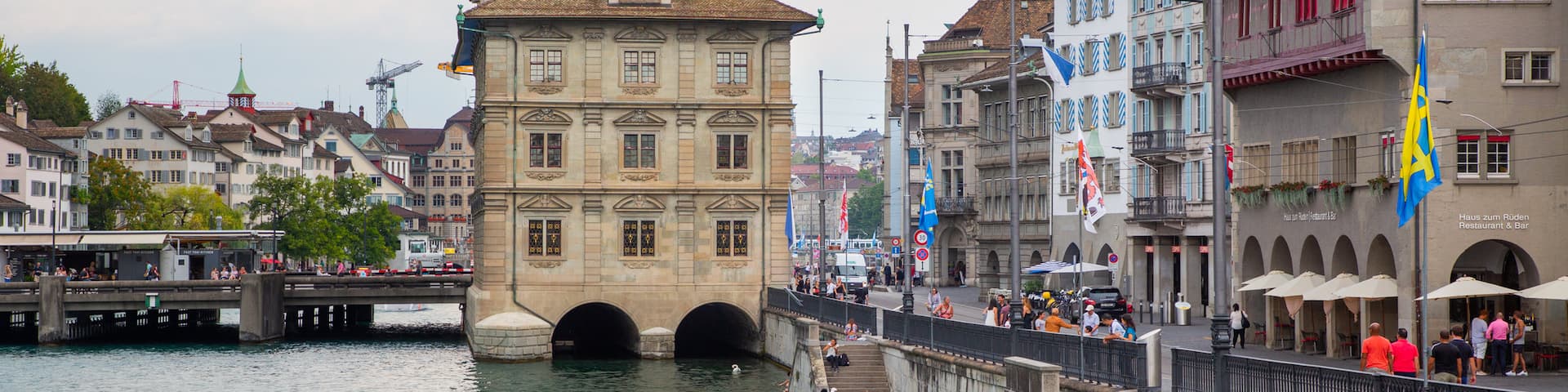 Zurich Town Hall featuring heritage elements and a bay or harbor
