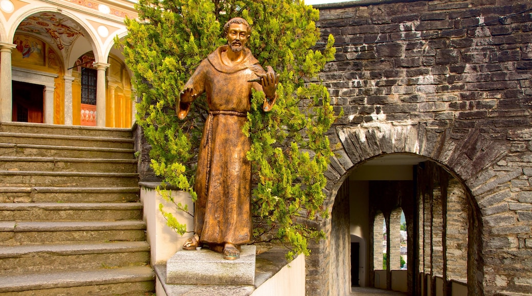 Madonna del Sasso showing a statue or sculpture and religious elements