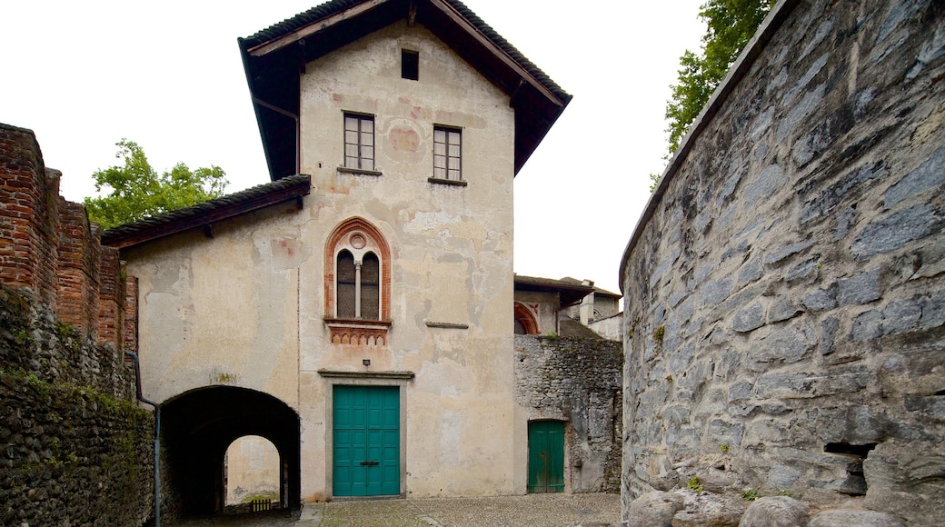 Castello Visconteo which includes heritage elements and a house