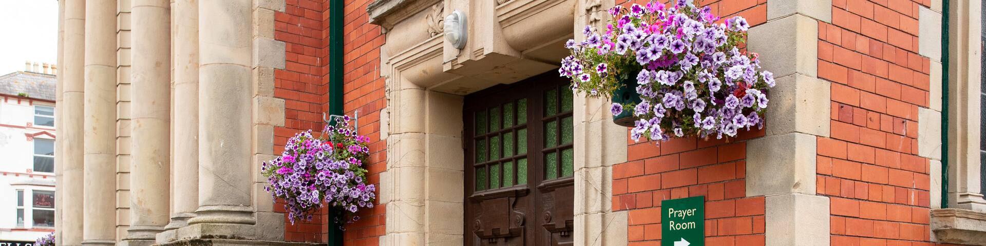 Emmanuel Christian Centre - Assemblies of God featuring flowers and heritage elements