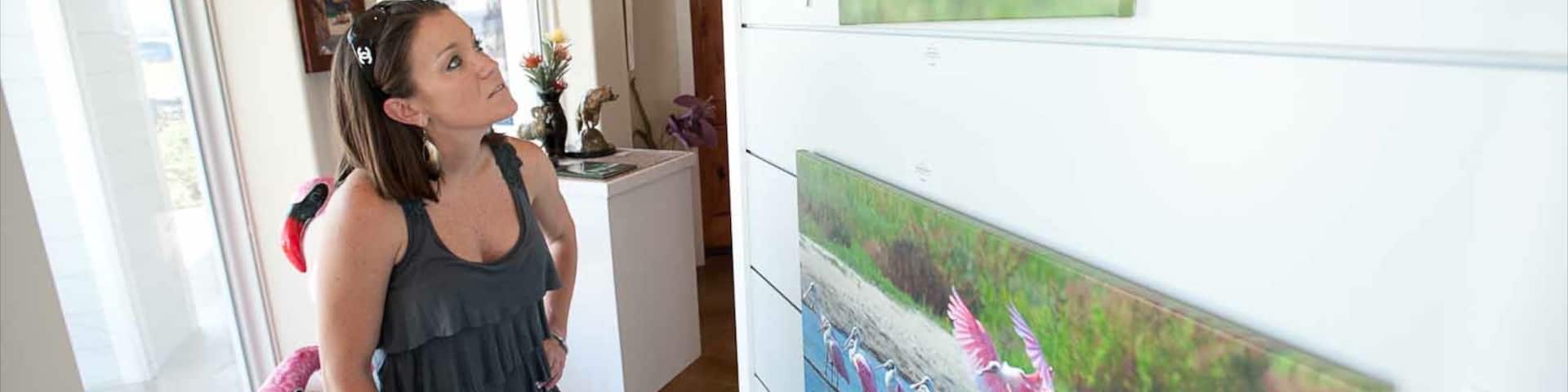 Port Aransas featuring art and interior views as well as an individual femail
