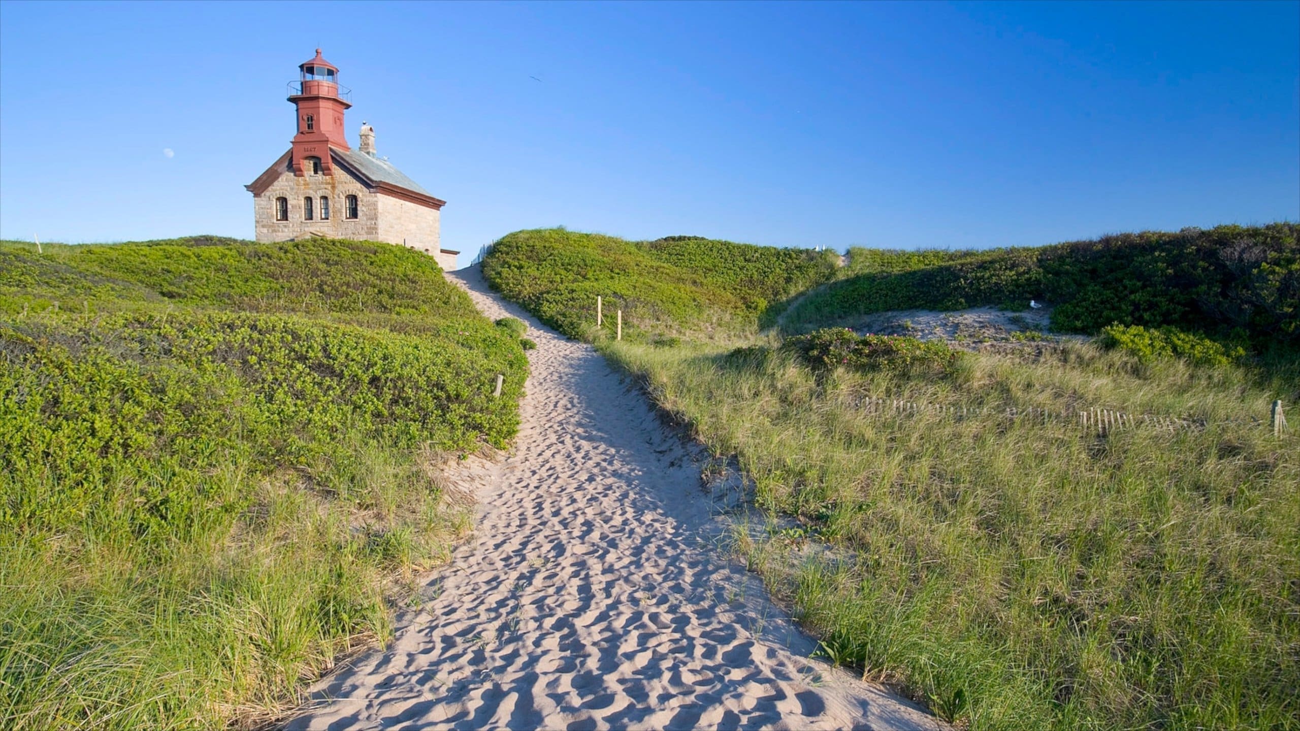 Block Island showing landscape views and a lighthouse