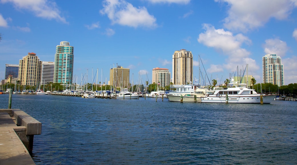 Demens Landing Park showing a bay or harbor, a high rise building and skyline