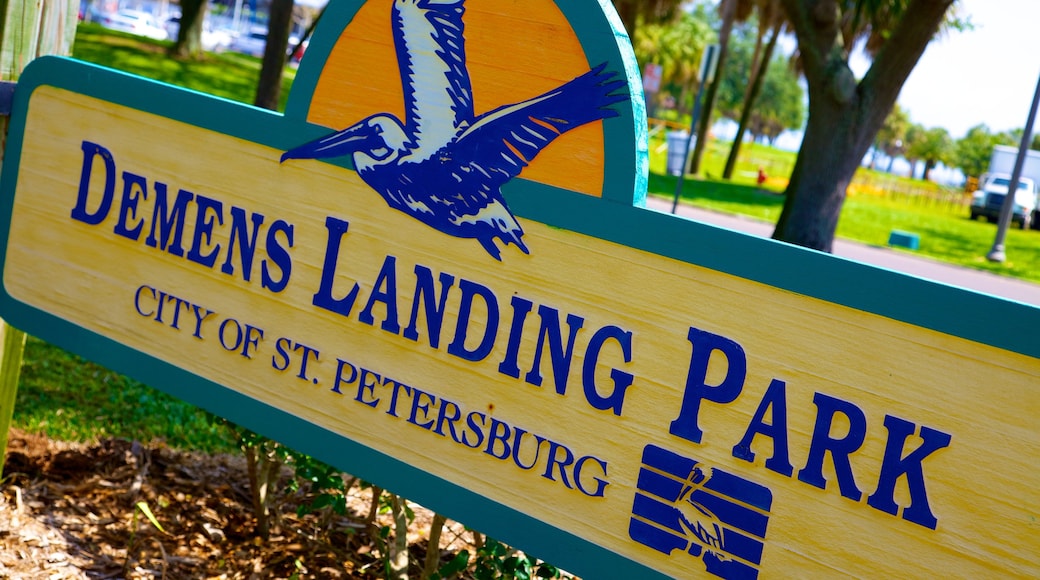 Demens Landing Park featuring signage and a park