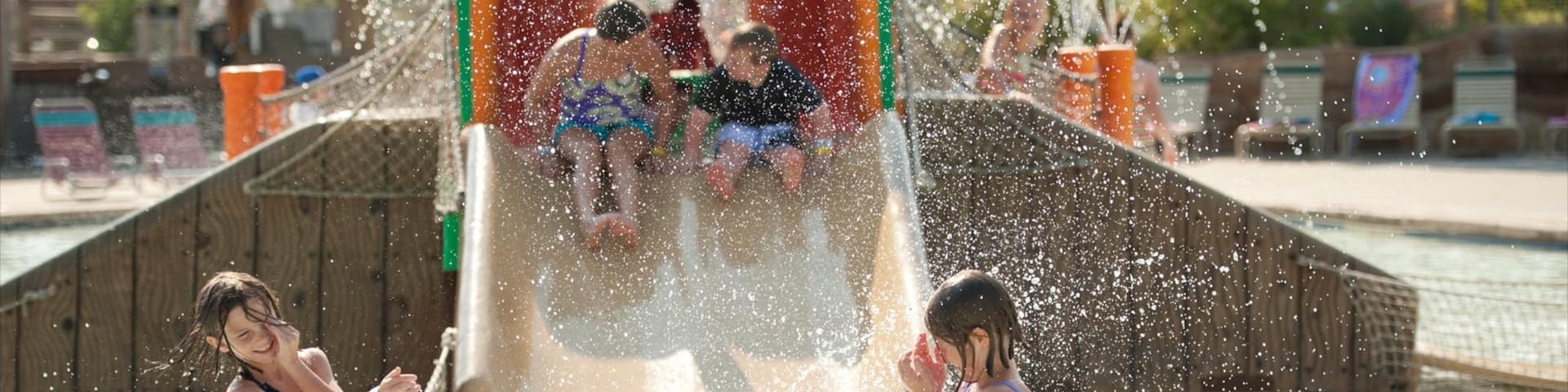 Kansas City showing a pool and a waterpark as well as children