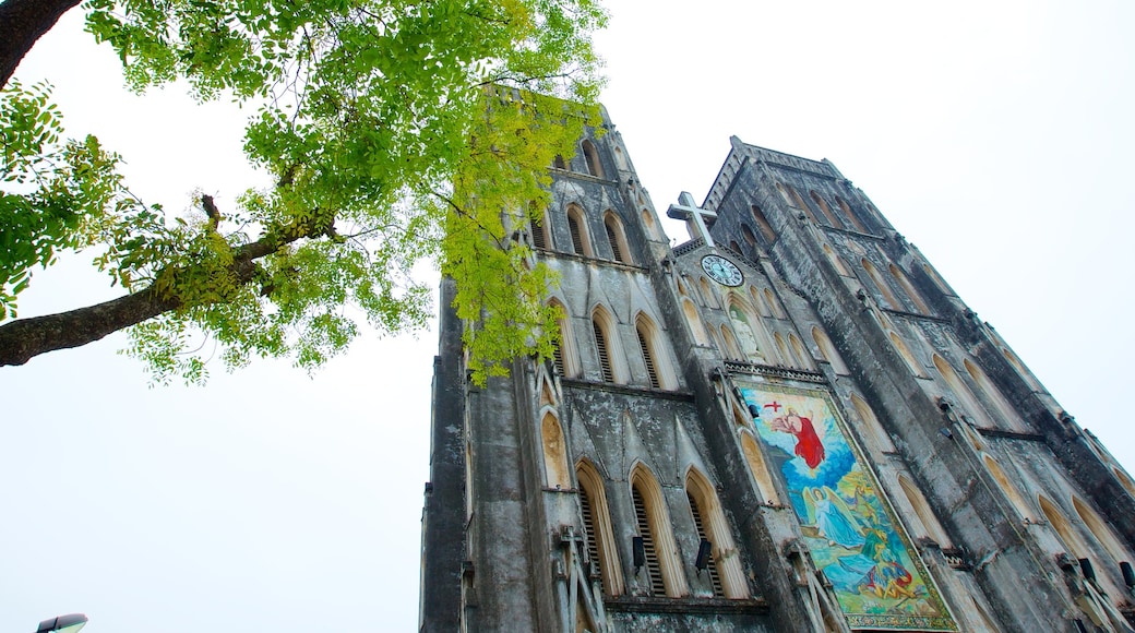 St. Joseph Cathedral which includes religious aspects, heritage architecture and a church or cathedral