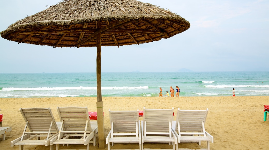 Cua Dai Beach showing a sandy beach, swimming and tropical scenes