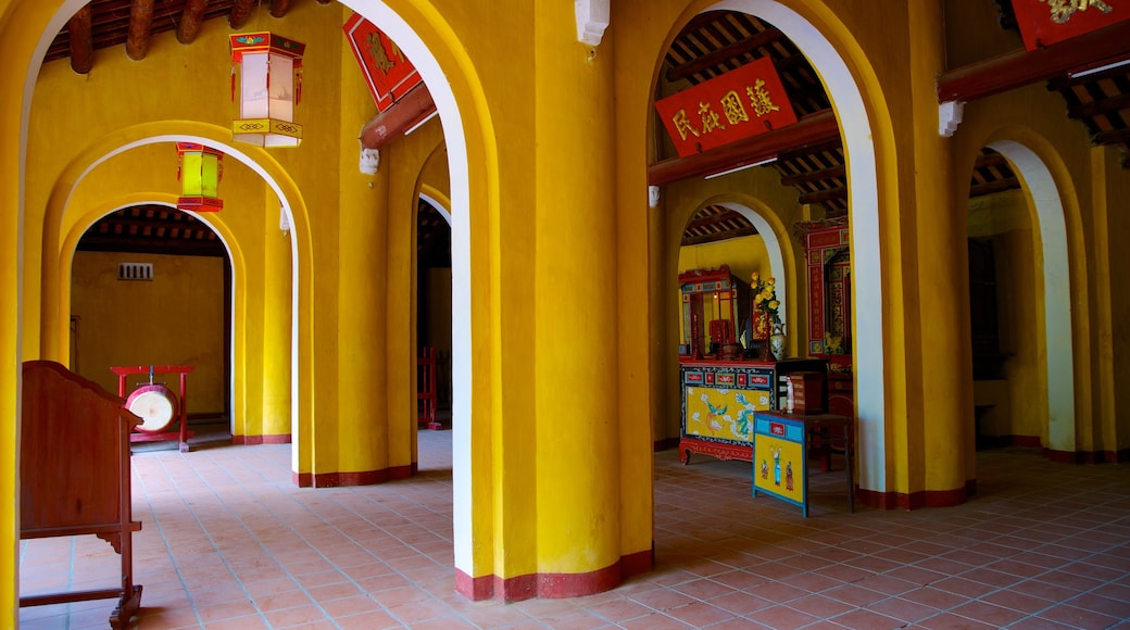 Cam Pho Temple featuring a temple or place of worship, heritage architecture and interior views