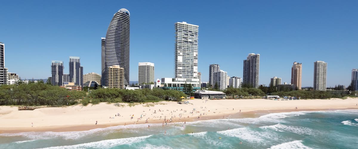 Broadbeach featuring skyline, a sandy beach and a high-rise building