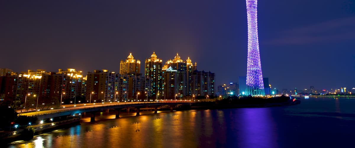 Canton Tower showing night scenes, a high rise building and city views