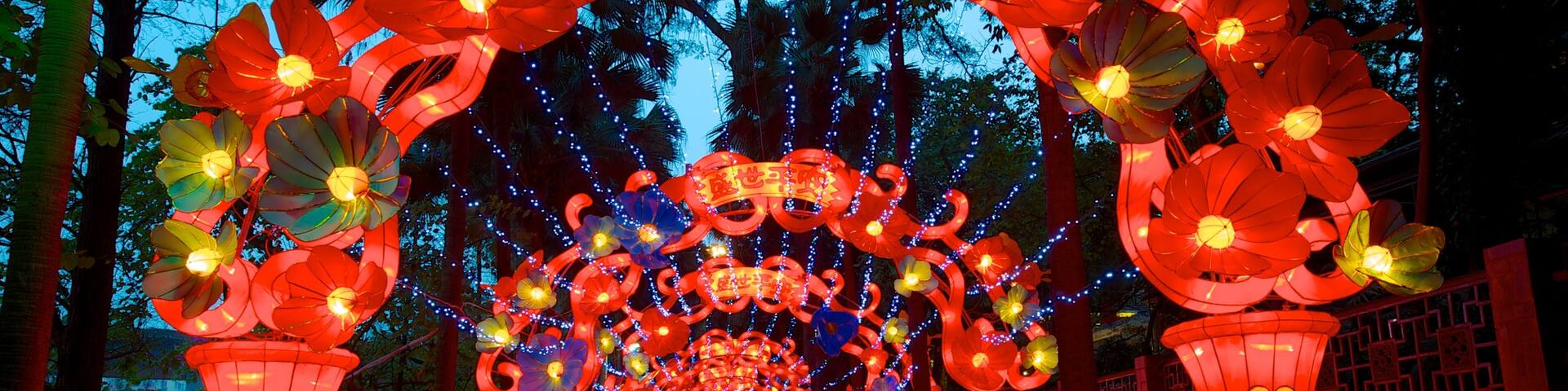 Yuexiu Park which includes outdoor art, night scenes and a garden