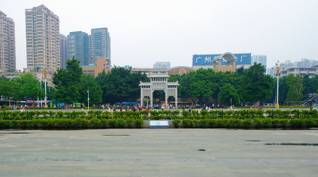 Chen Family Temple - Guangdong Folk Art Museum showing a city, a high rise building and a square or plaza