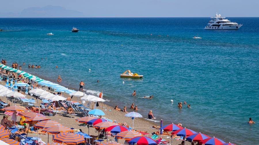Maronti Beach showing a beach, general coastal views and swimming