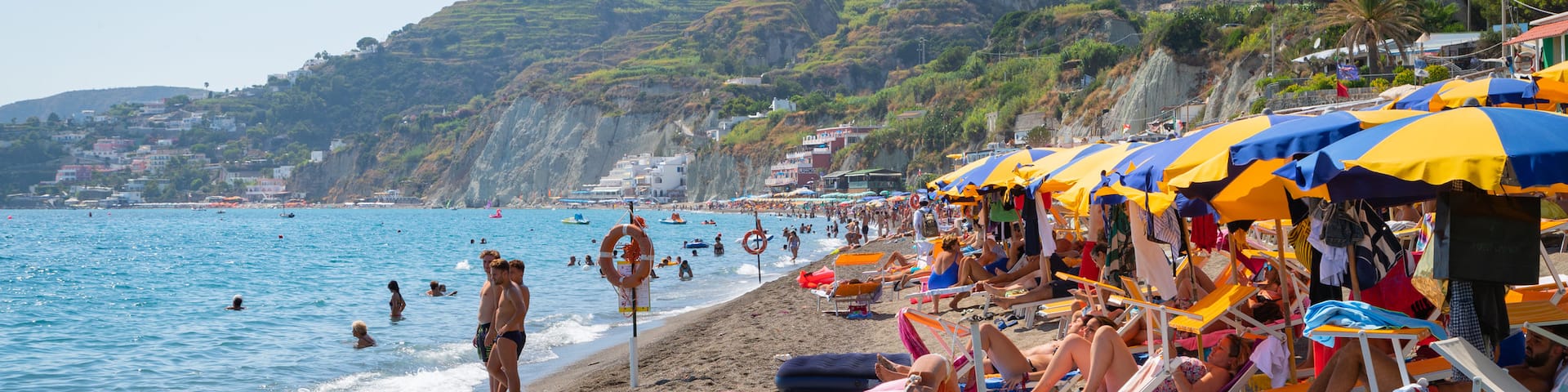 Maronti Beach which includes a beach, general coastal views and swimming