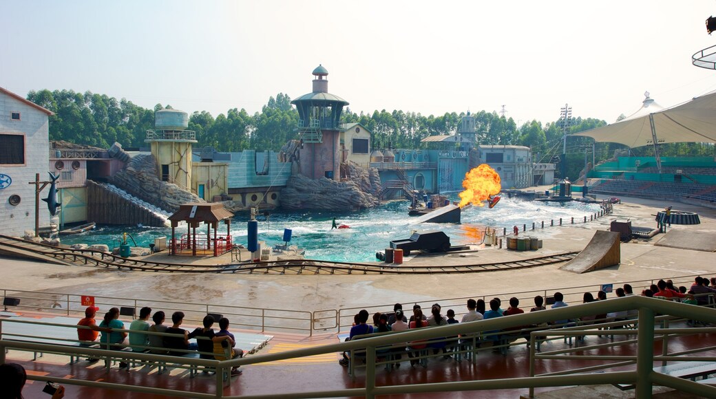 Chimelong Paradise showing rides as well as a large group of people