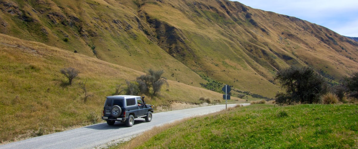 Moke Lake which includes tranquil scenes and off road driving