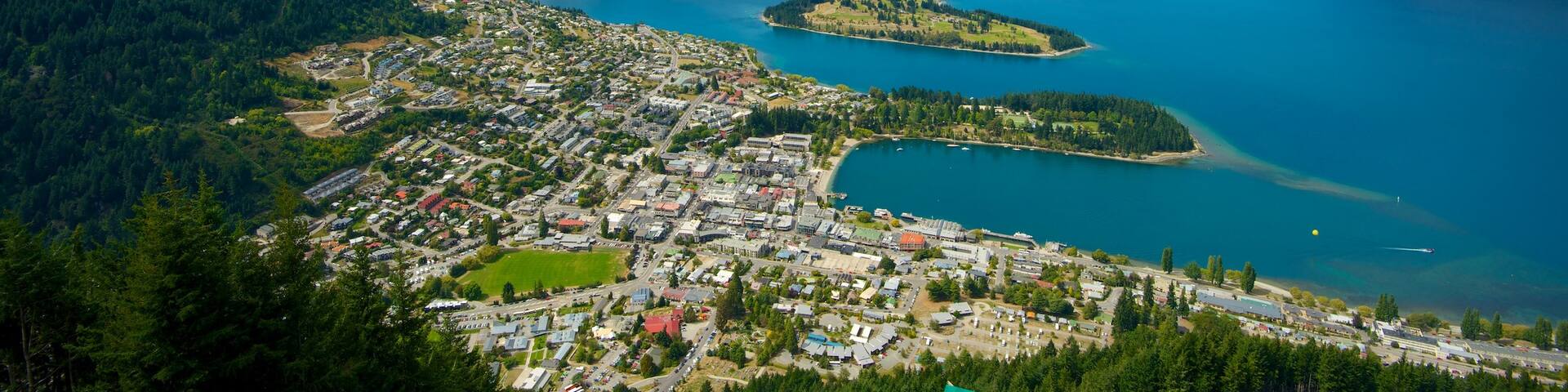 Skyline Gondola which includes a bay or harbour and a coastal town