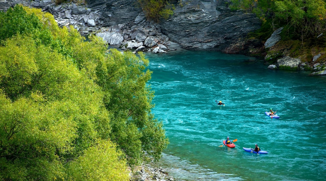 Kawarau Suspension Bridge which includes kayaking or canoeing, a river or creek and rapids