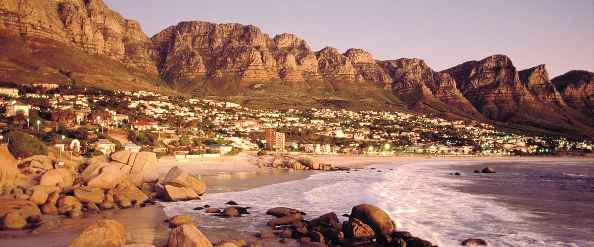 Camps Bay which includes mountains, general coastal views and landscape views