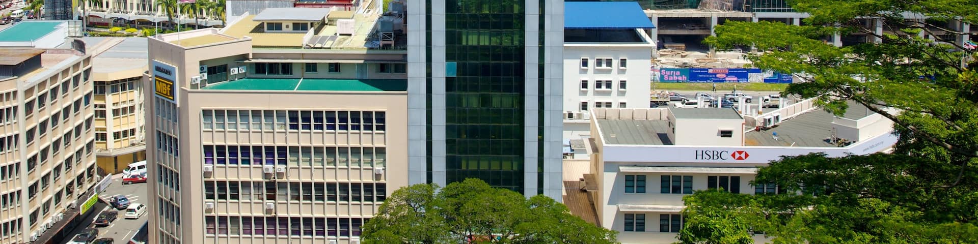 Kota Kinabalu showing a high rise building, general coastal views and a city