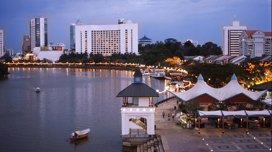 Kuching which includes boating, city views and a bay or harbour