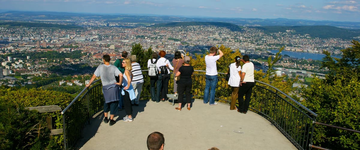 Zurich which includes views and a city as well as a large group of people