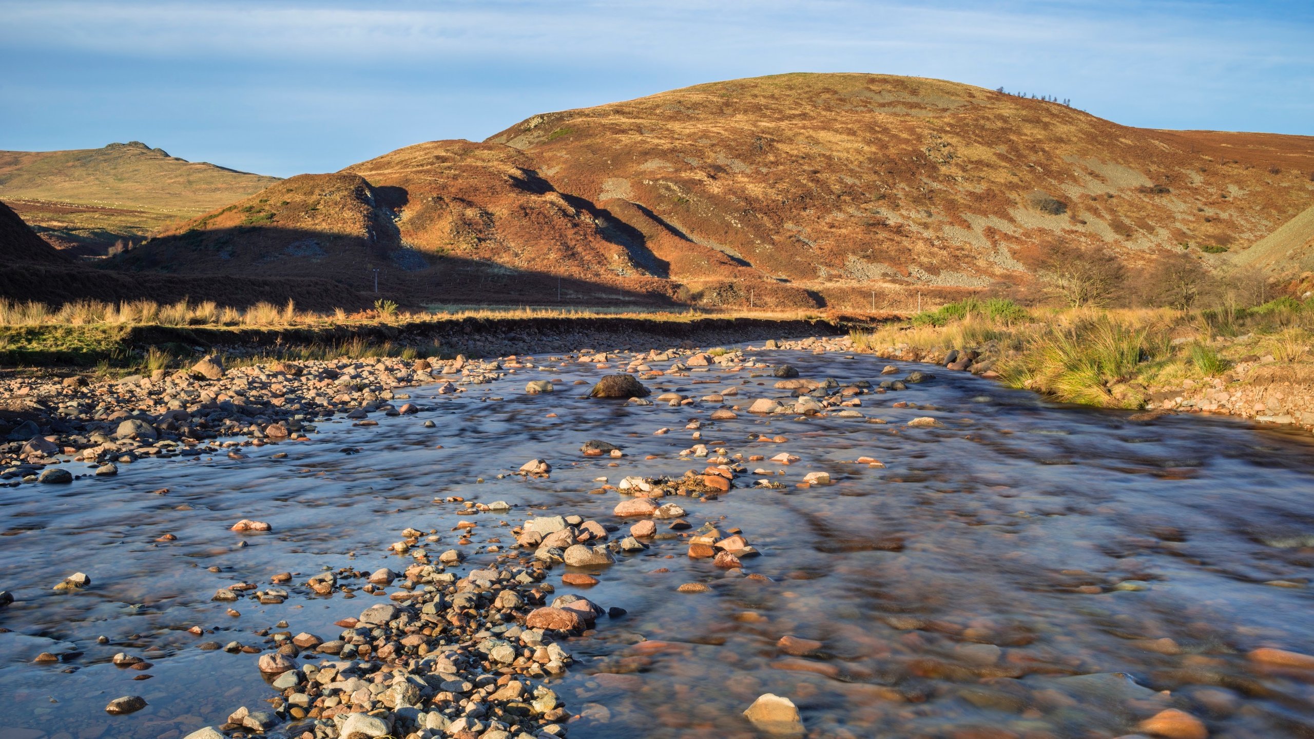 Northumberland National Park which includes tranquil scenes and a river or creek