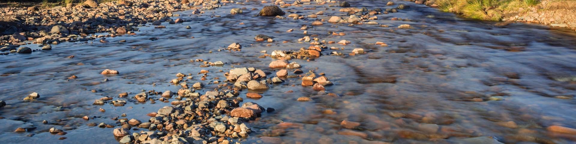 Northumberland National Park which includes tranquil scenes and a river or creek